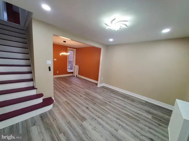 a view of entryway with wooden floor