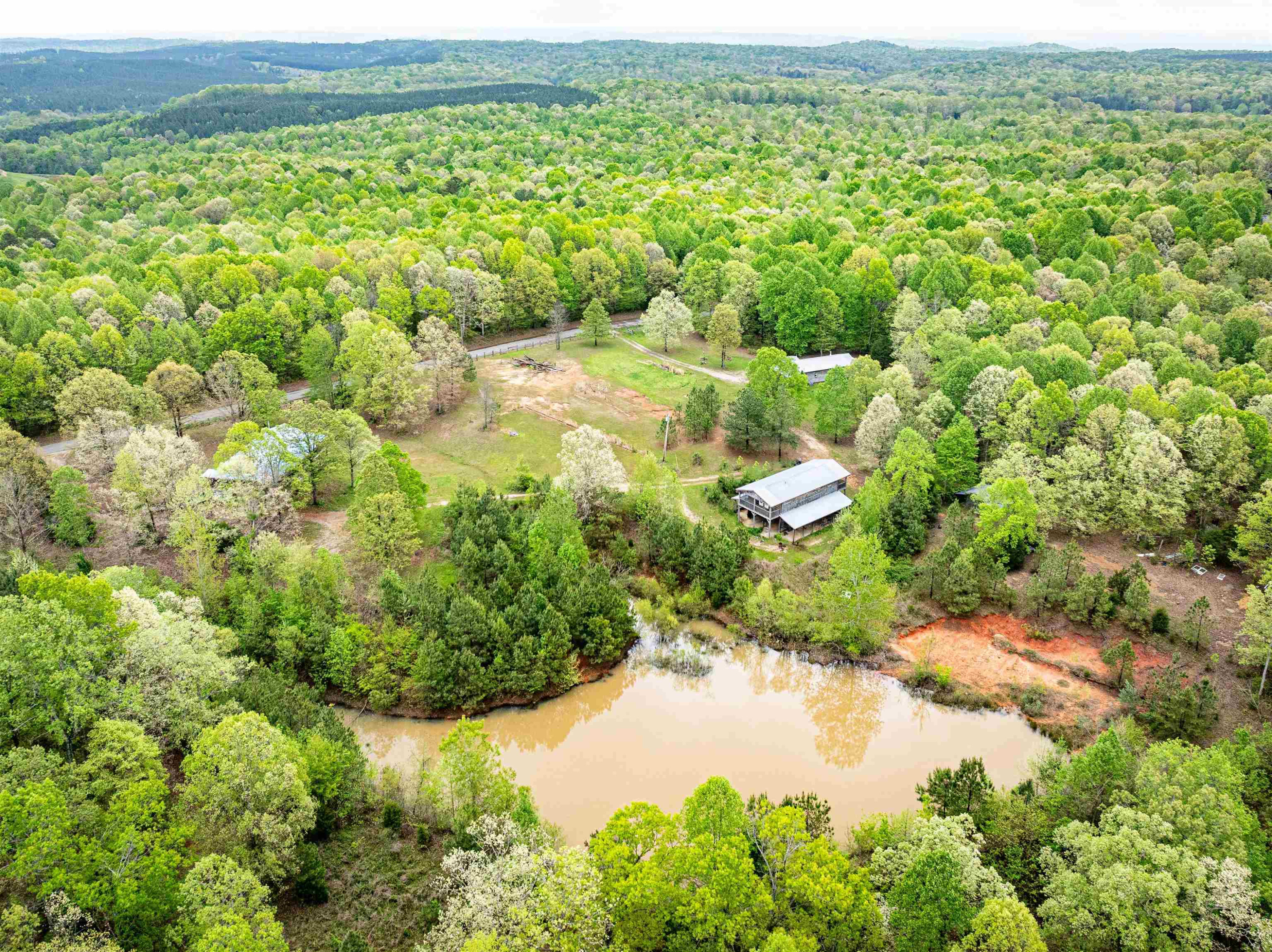 800 Bob's Landing Road Bath Springs, TN 38311 - Photo 1 of 48 a view of a garden with a lake