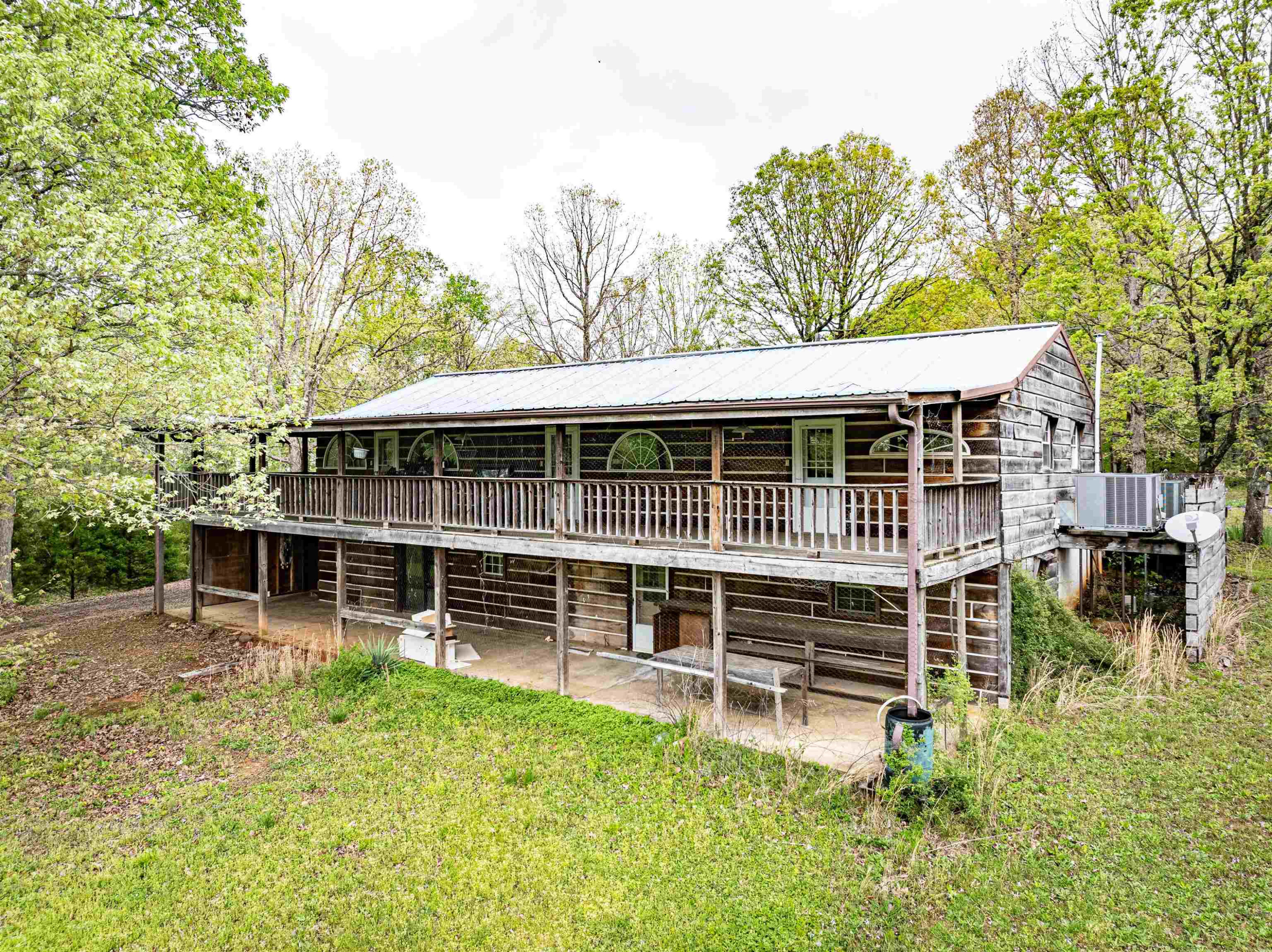 800 Bob's Landing Road Bath Springs, TN 38311 - Photo 11 of 48 a view of house with a yard and sitting area