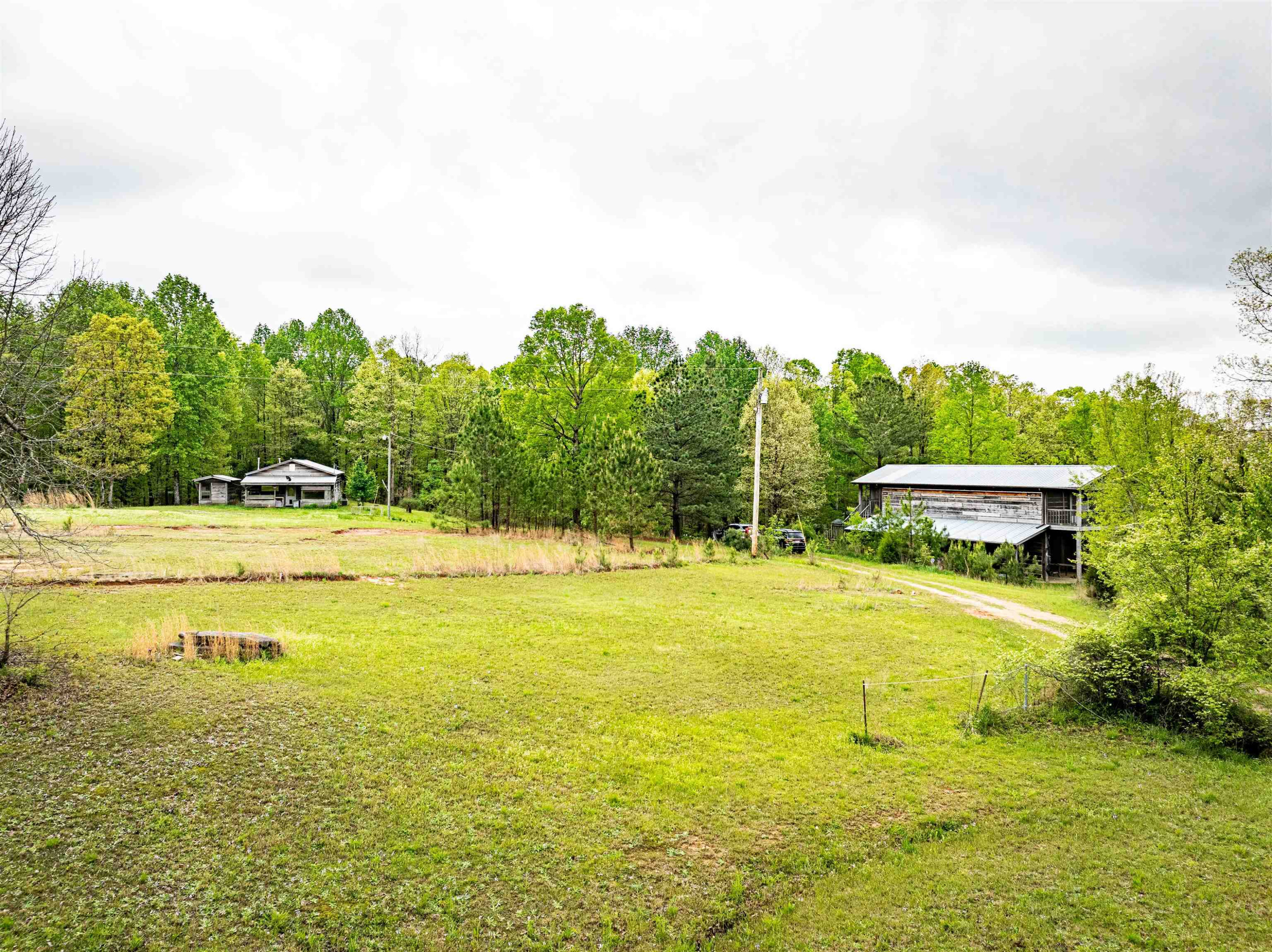 800 Bob's Landing Road Bath Springs, TN 38311 - Photo 12 of 48 a swimming pool with trees in the background