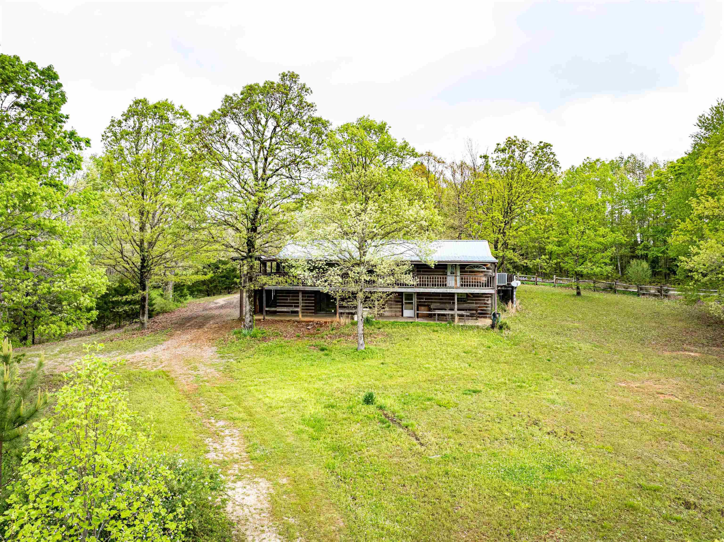 800 Bob's Landing Road Bath Springs, TN 38311 - Photo 13 of 48 a swimming pool with some trees in the background
