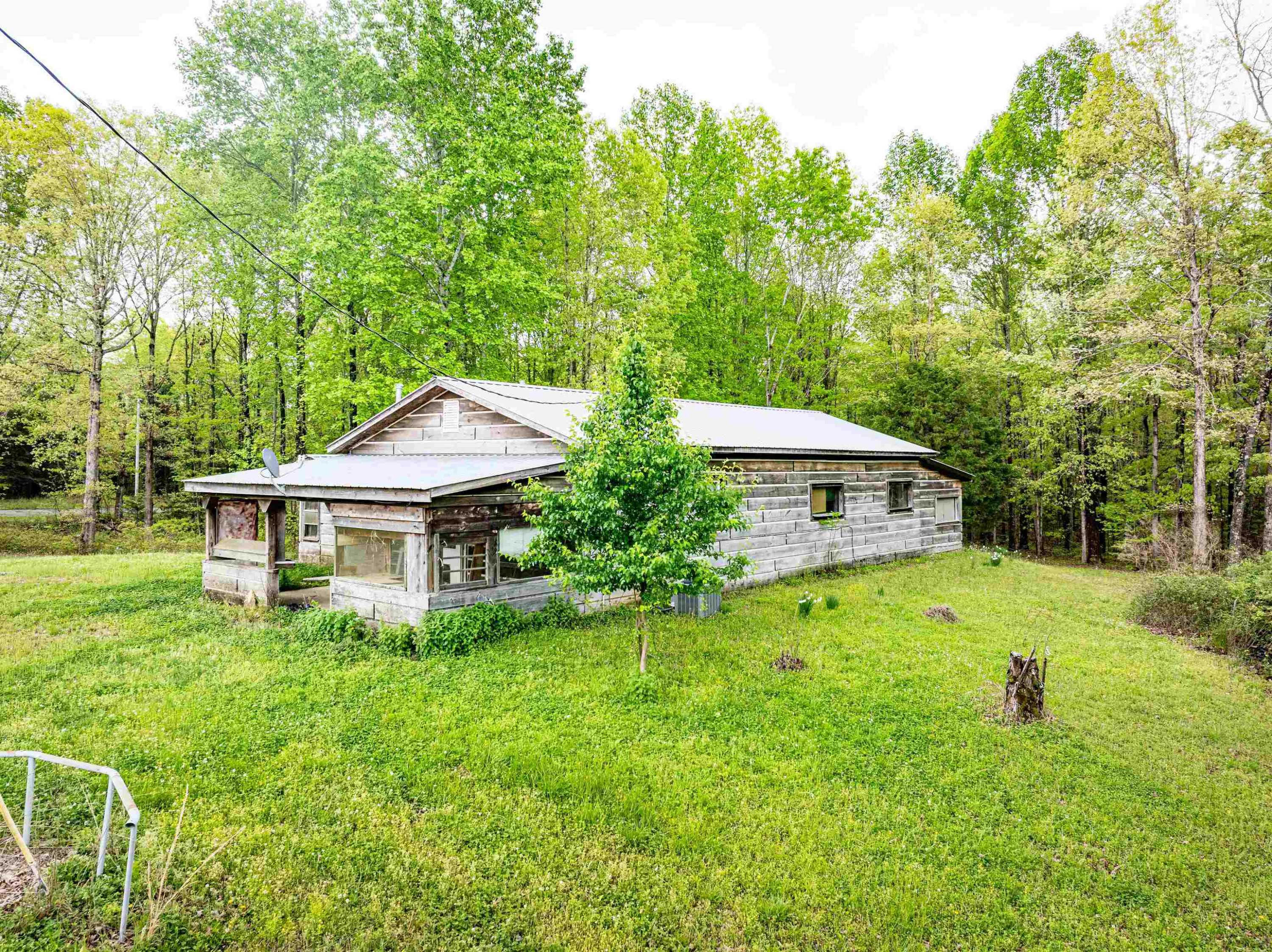 800 Bob's Landing Road Bath Springs, TN 38311 - Photo 24 of 48 a house view with a garden space