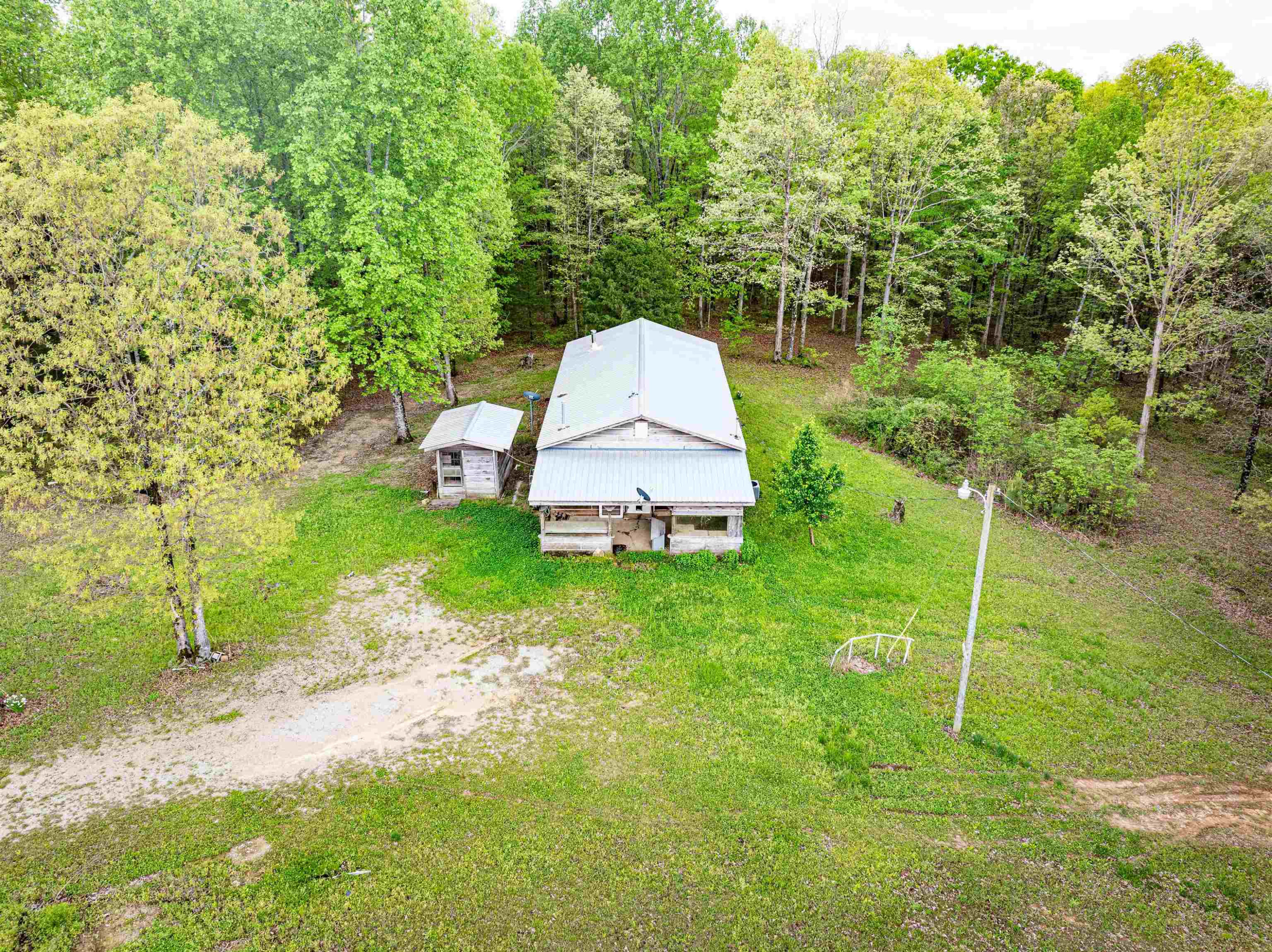 800 Bob's Landing Road Bath Springs, TN 38311 - Photo 25 of 48 a view of a backyard with swimming pool