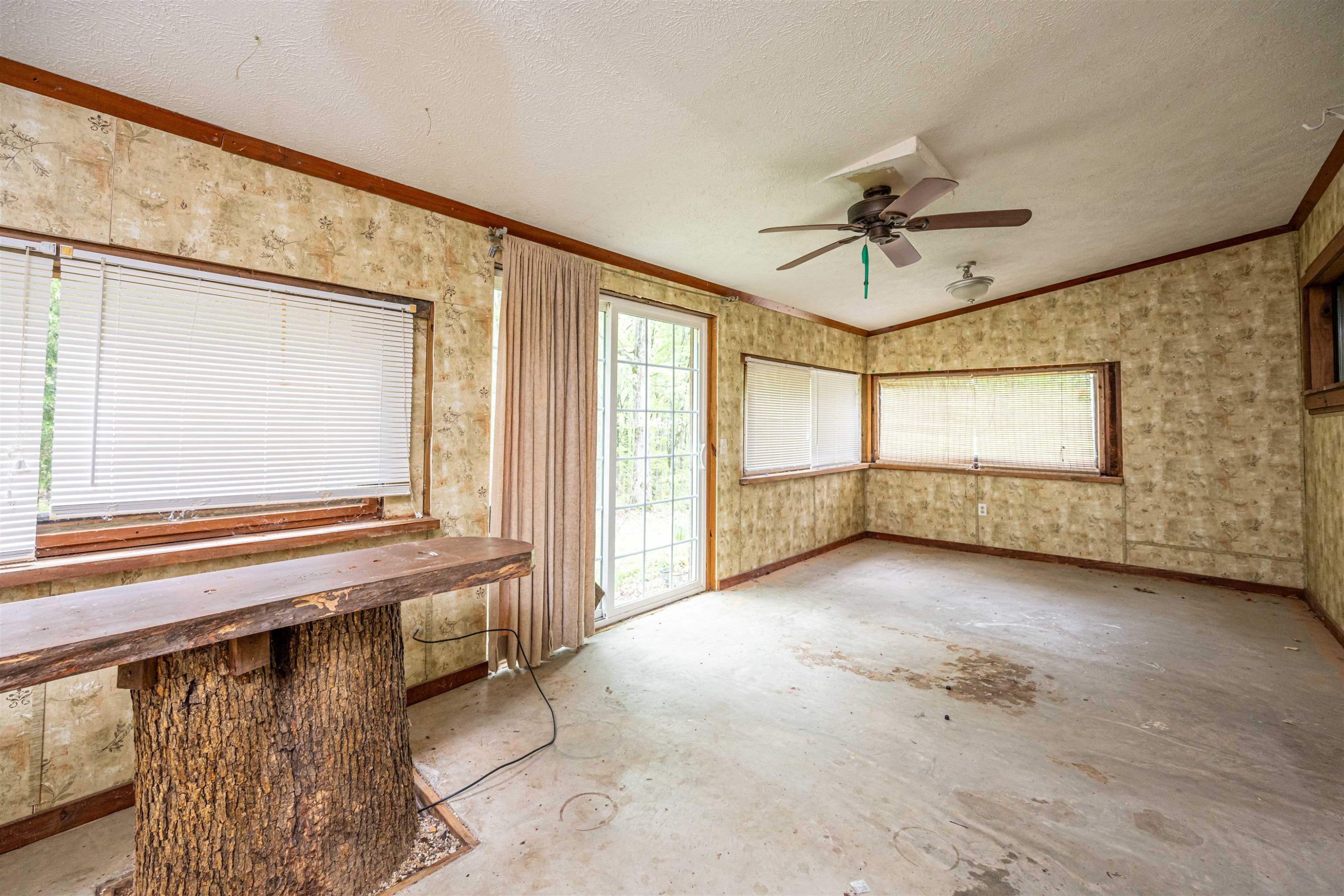 800 Bob's Landing Road Bath Springs, TN 38311 - Photo 37 of 48 a view of an empty room with windows