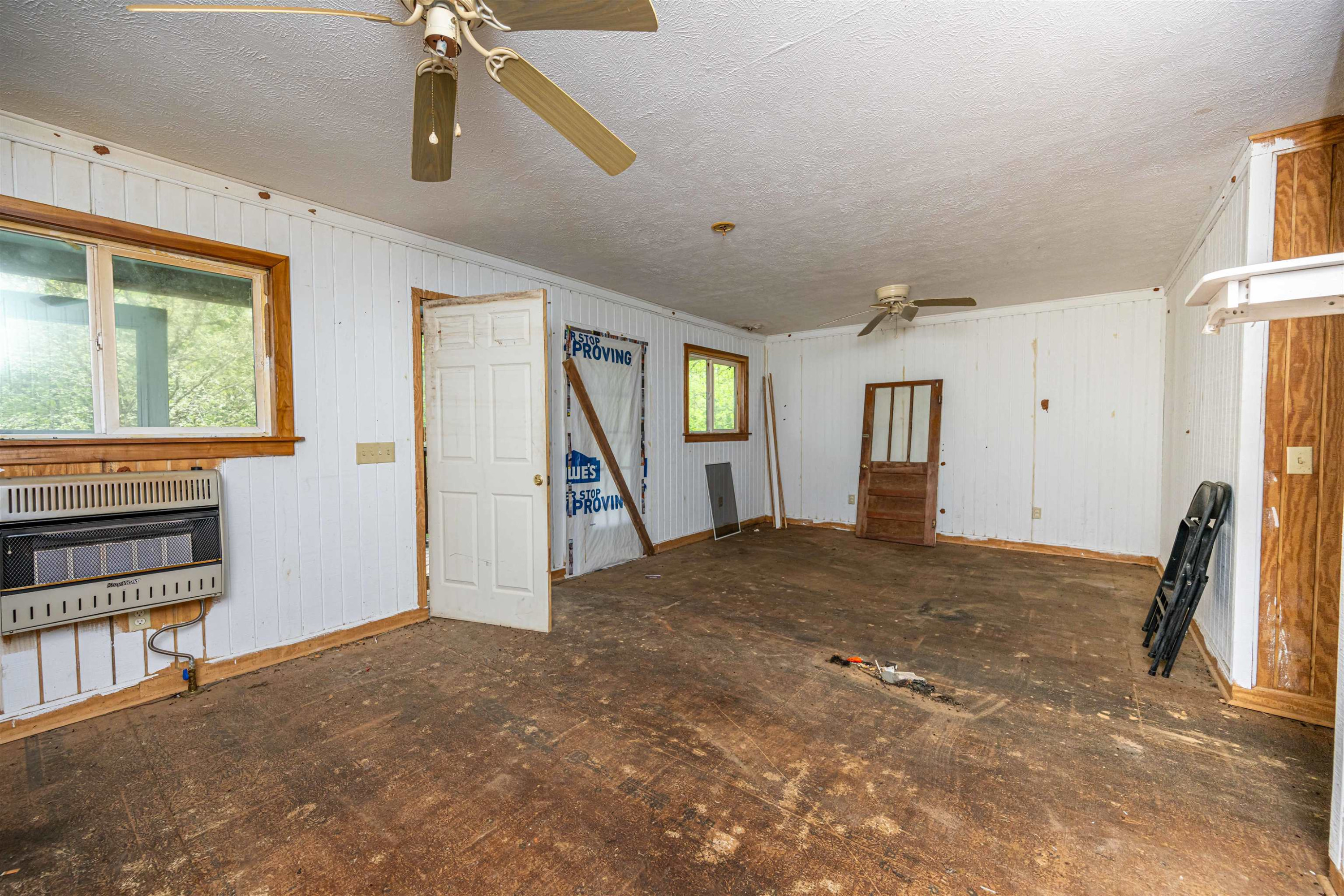 800 Bob's Landing Road Bath Springs, TN 38311 - Photo 43 of 48 a view of a hallway with a bedroom and a window