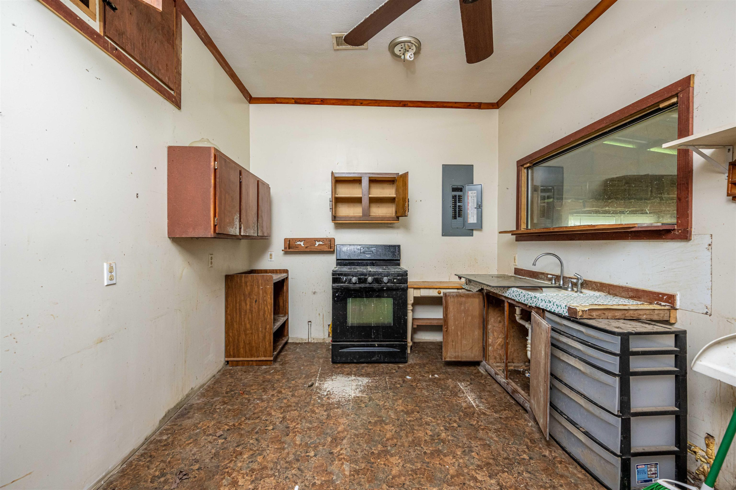 800 Bob's Landing Road Bath Springs, TN 38311 - Photo 45 of 48 a kitchen with stainless steel appliances a stove microwave and refrigerator