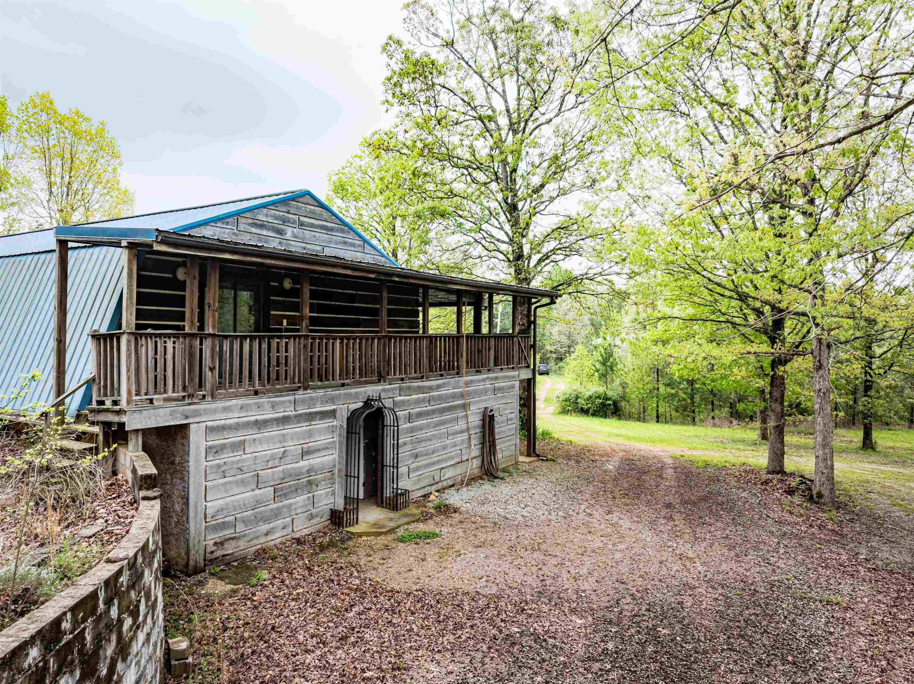 800 Bob's Landing Road Bath Springs, TN 38311 - Photo 8 of 48 a view of a house with a yard