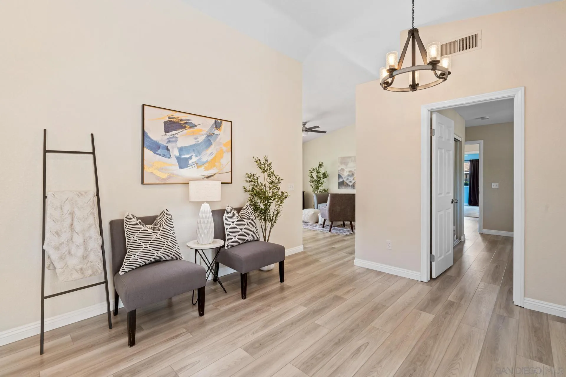 16151 Dartolo Road Ramona, CA 92065 - Photo 35 of 56 a living room with furniture and a wooden floor