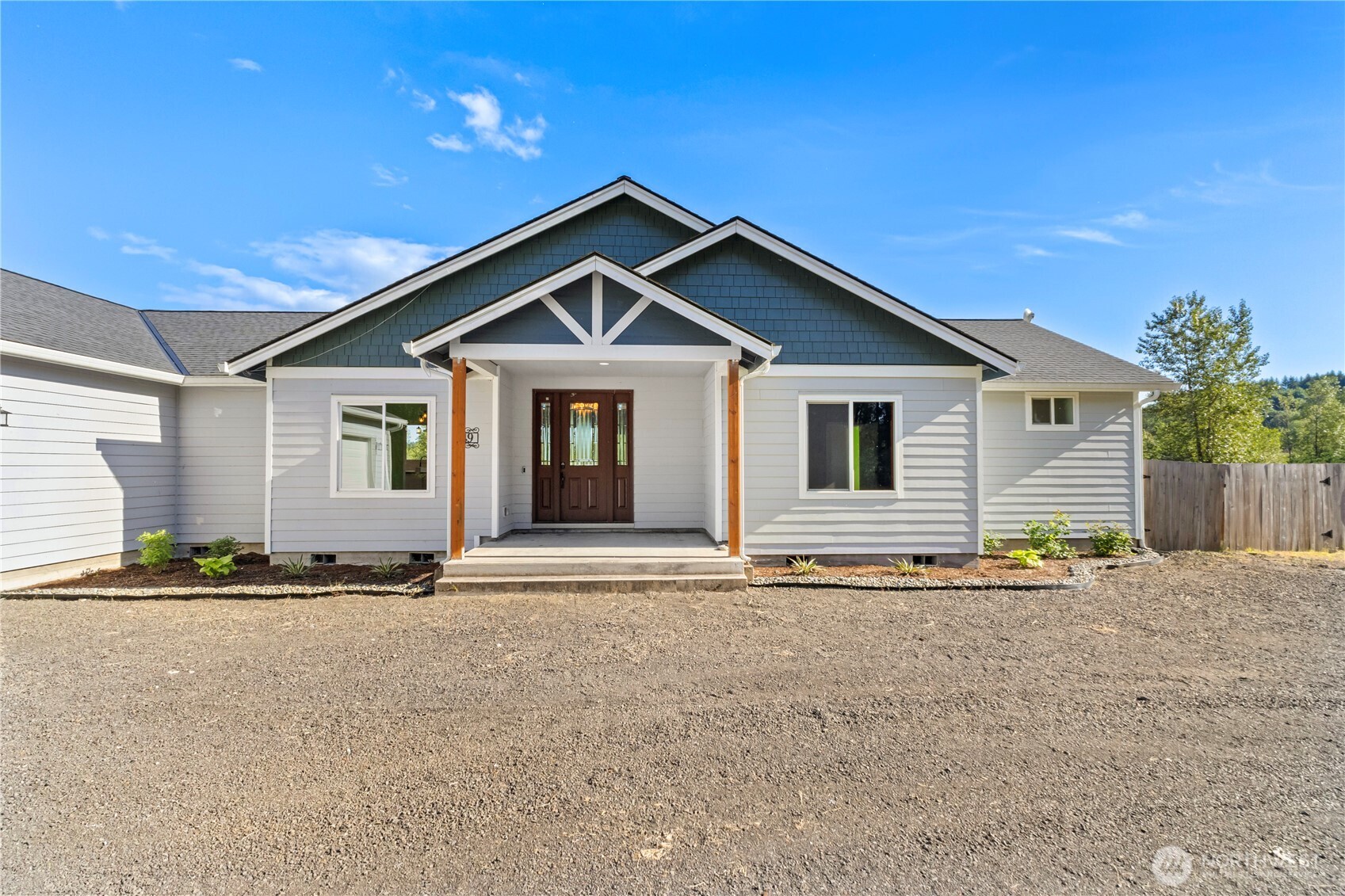 249 Flatt Road Kelso, WA 98626 - Photo 2 of 39 a front view of a house with a yard