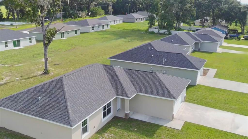 17604 Southwest 112th Lane Dunnellon, FL 34432 - Photo 19 of 23 a view of a house with yard and parking