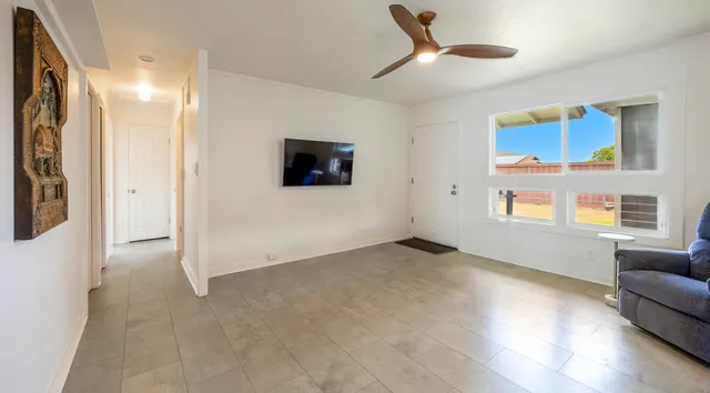 a view of livingroom with furniture and windows