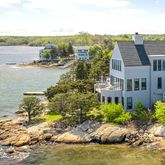 a view of a lake with a house