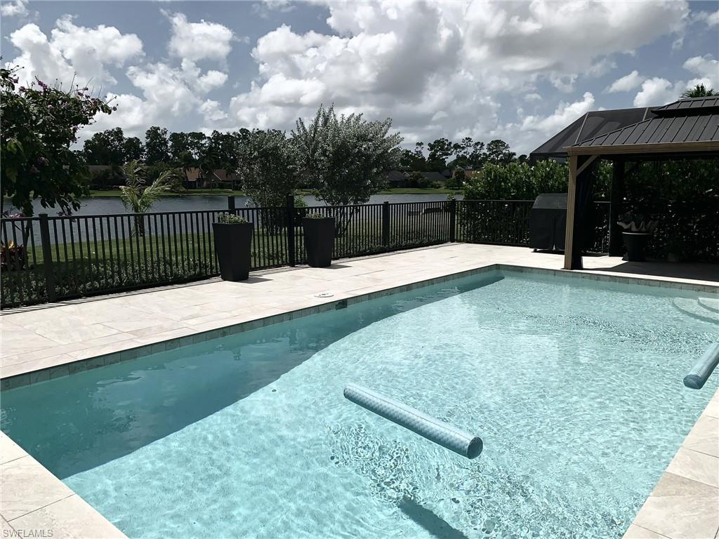 1344 Monarch Circle Naples, FL 34116 - Photo 20 of 33 a view of a garden