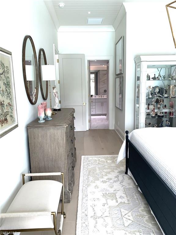 1344 Monarch Circle Naples, FL 34116 - Photo 25 of 33 a en suite bathroom with a bathtub sink and glass door