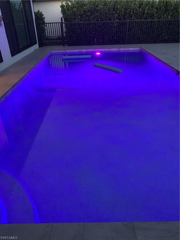 1344 Monarch Circle Naples, FL 34116 - Photo 30 of 33 a view of swimming pool with patio
