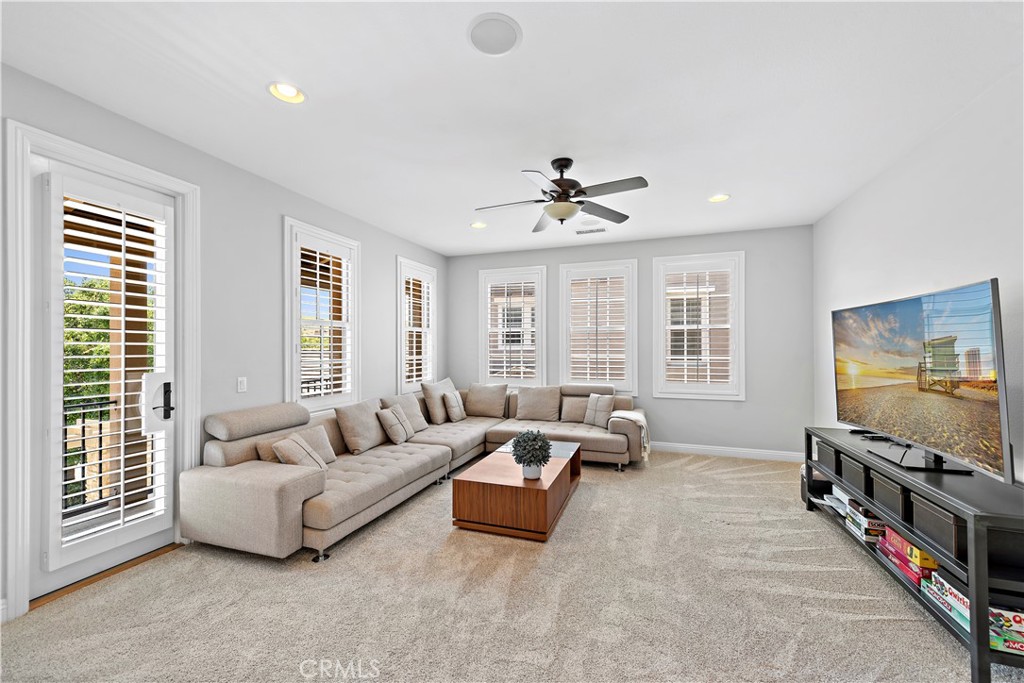 11 Pisano Street Ladera Ranch, CA 92694 - Photo 28 of 47 a living room with furniture and windows