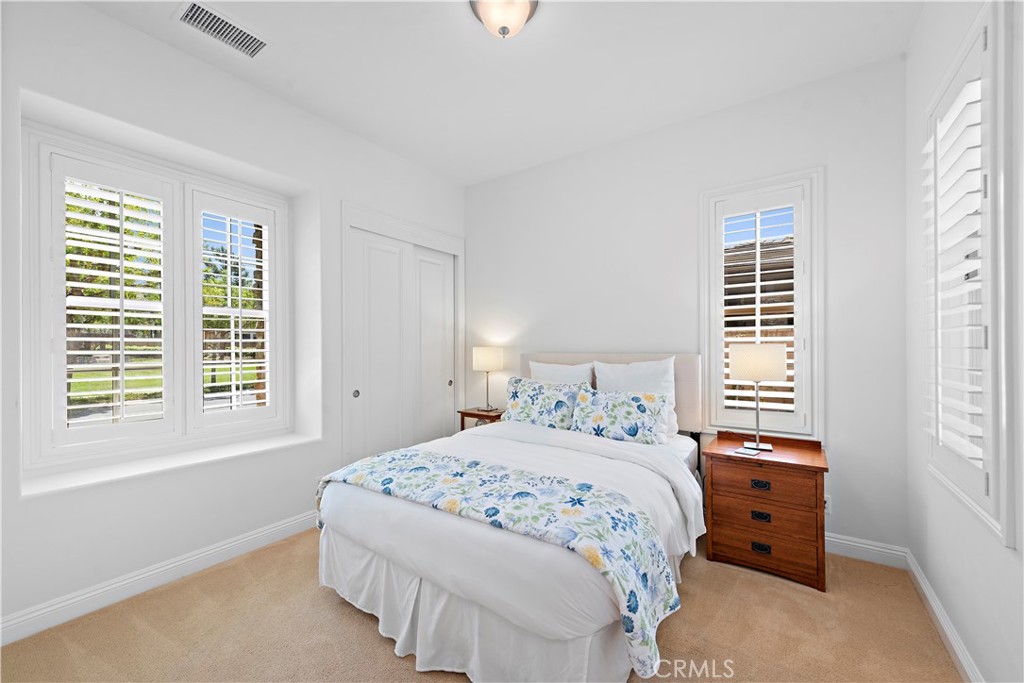 11 Pisano Street Ladera Ranch, CA 92694 - Photo 29 of 47 a bedroom with a bed and a window