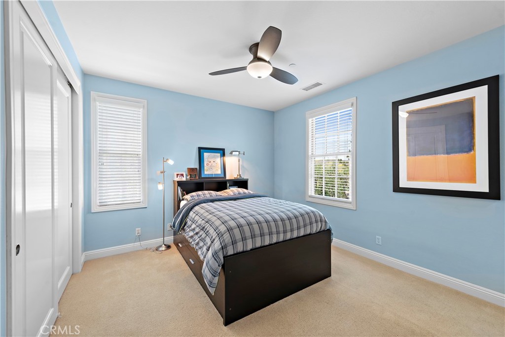 11 Pisano Street Ladera Ranch, CA 92694 - Photo 30 of 47 a bedroom with a bed and window