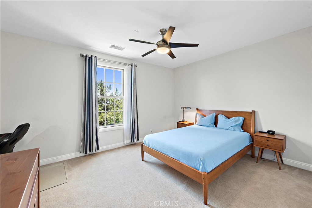 11 Pisano Street Ladera Ranch, CA 92694 - Photo 31 of 47 a bedroom with a bed and a window