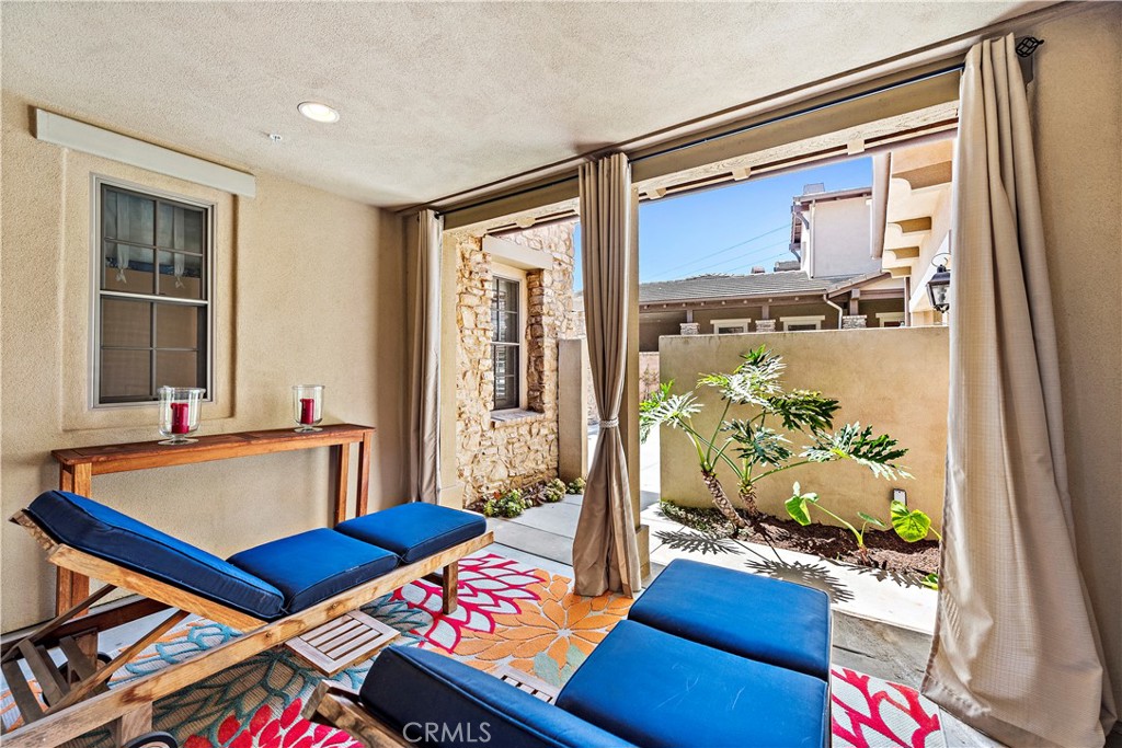 11 Pisano Street Ladera Ranch, CA 92694 - Photo 4 of 47 a living room with furniture and a window