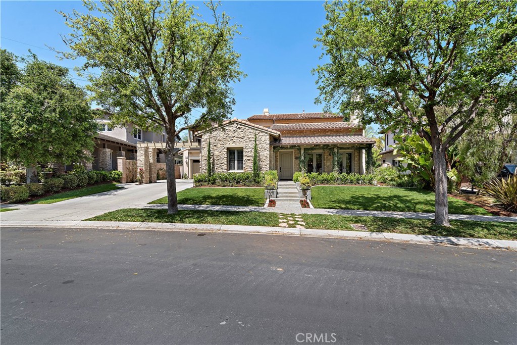 11 Pisano Street Ladera Ranch, CA 92694 - Photo 42 of 47 a front view of a house with a yard