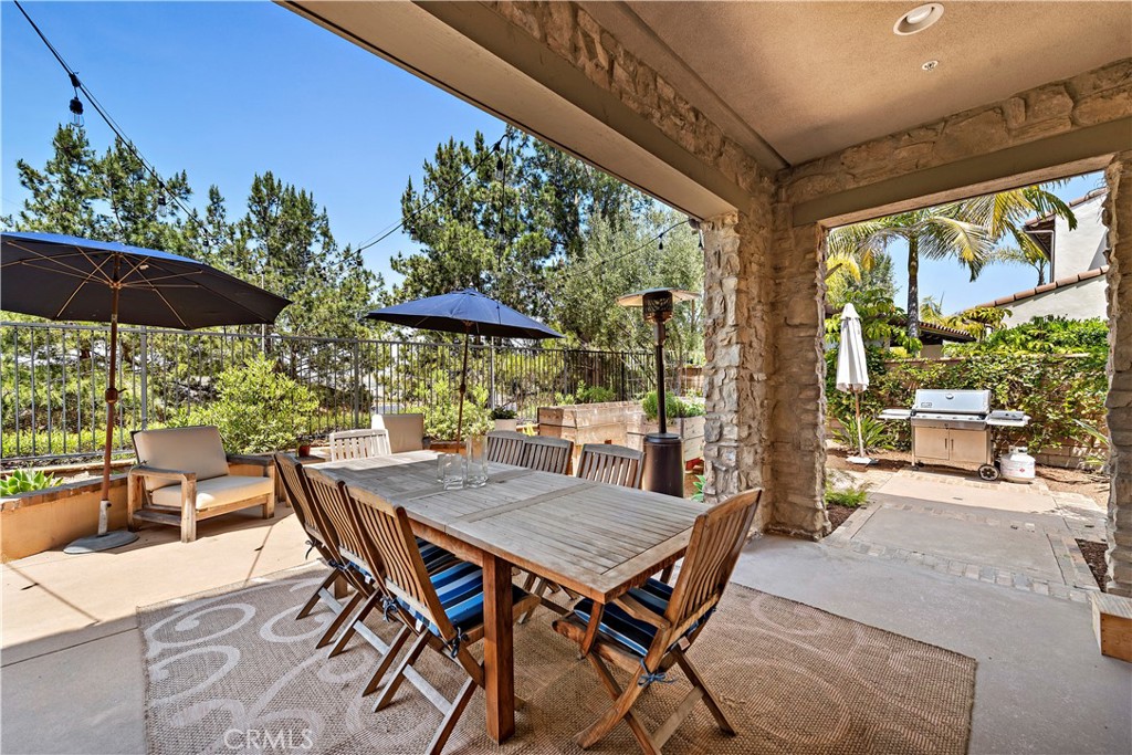 11 Pisano Street Ladera Ranch, CA 92694 - Photo 6 of 47 a view of a patio with furniture and yard