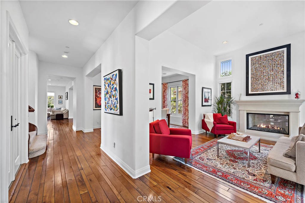 11 Pisano Street Ladera Ranch, CA 92694 - Photo 7 of 47 a living room with furniture and a fireplace