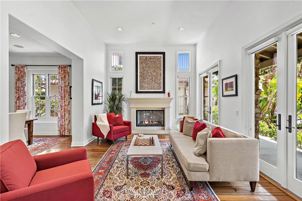 11 Pisano Street Ladera Ranch, CA 92694 - Photo 8 of 47 a living room with furniture fireplace and a large window