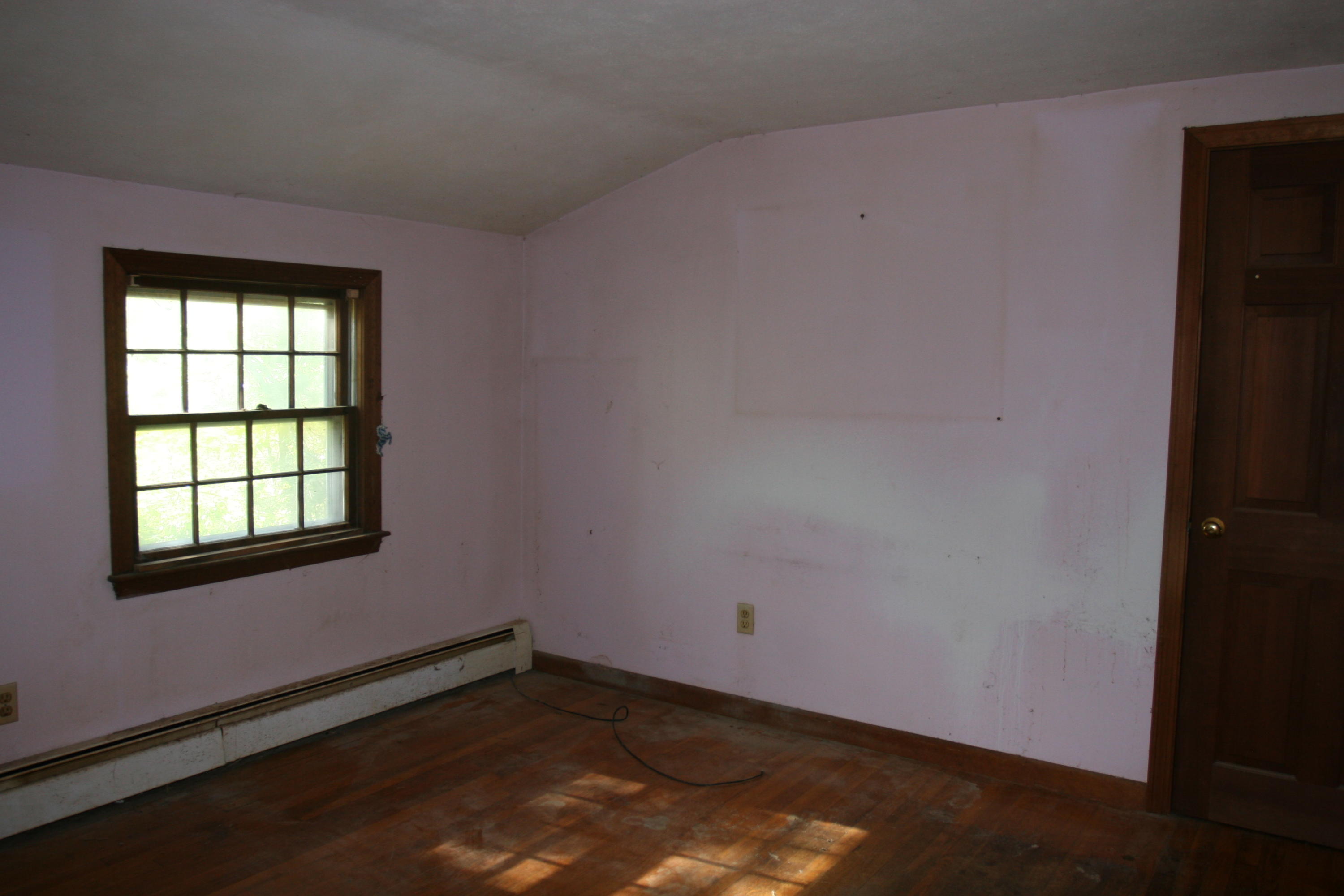 117 Turtleback Road Marstons Mills, MA 02648 - Photo 17 of 35 an empty room with a window