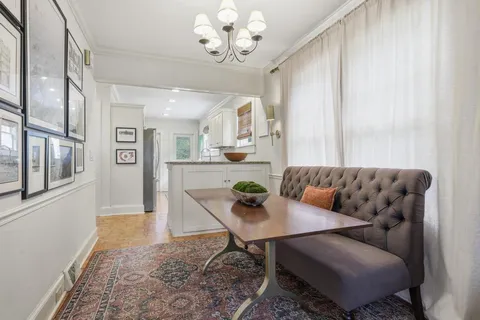 a kitchen with granite countertop stainless steel appliances sink and cabinets