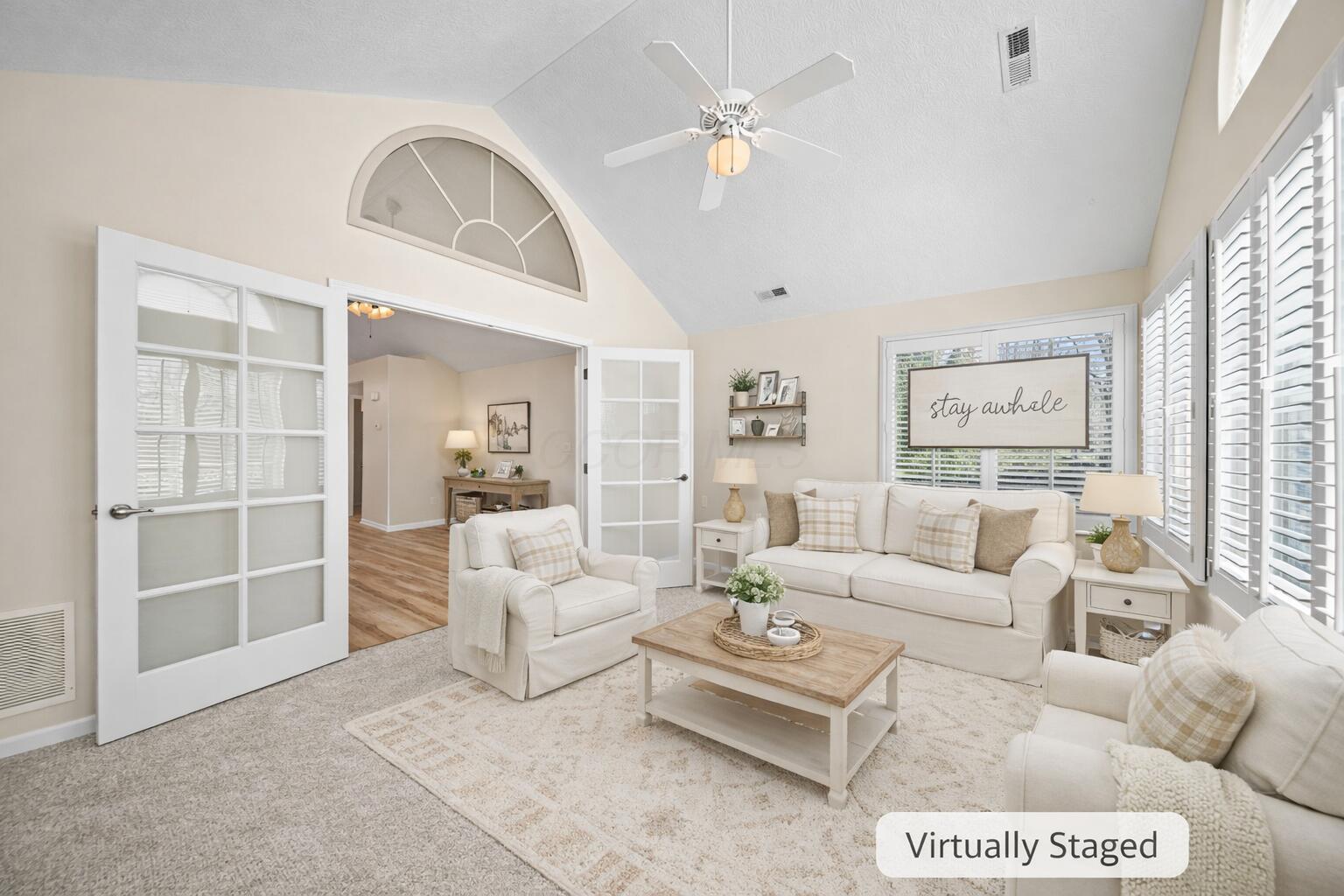 225 Stonegate Loop, Unit 225 Pataskala, OH 43062 - Photo 20 of 41 Bright farmhouse sunroom with cozy decor