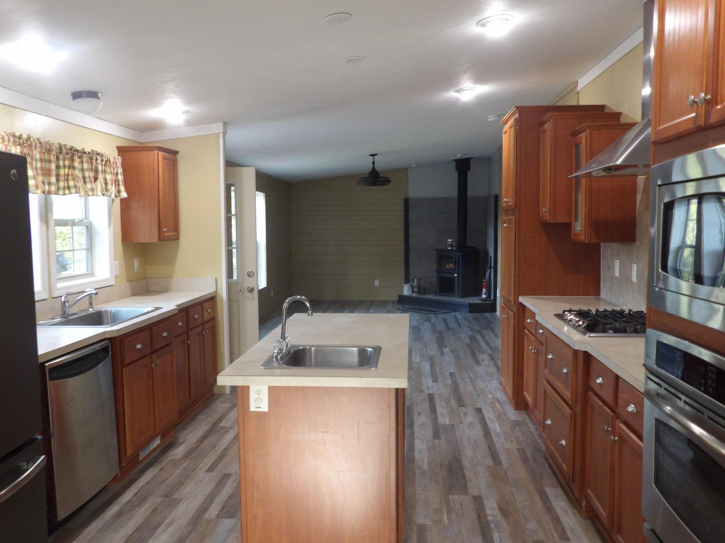 41 Wrong Way Harborside, ME 04642 - Photo 13 of 33 Hanrahan kitchen to living area