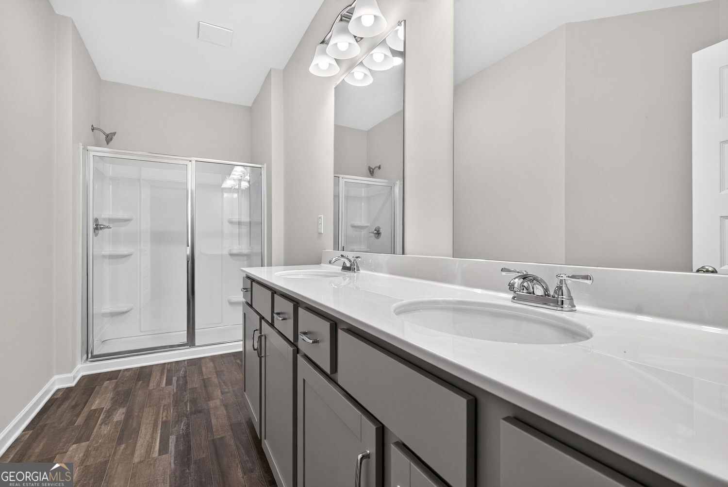 155 Oconee Road, Unit 252 Cartersville, GA 30120 - Photo 24 of 39 a bathroom with a granite countertop sink and a mirror