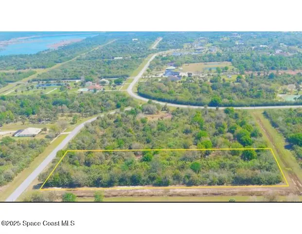 a black and white photo of a field