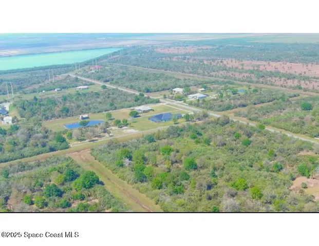 a black and white photo of a field