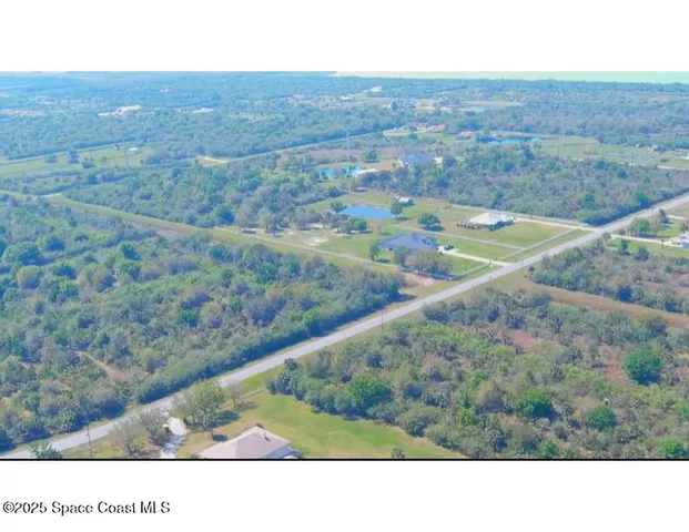 a black and white photo of a field