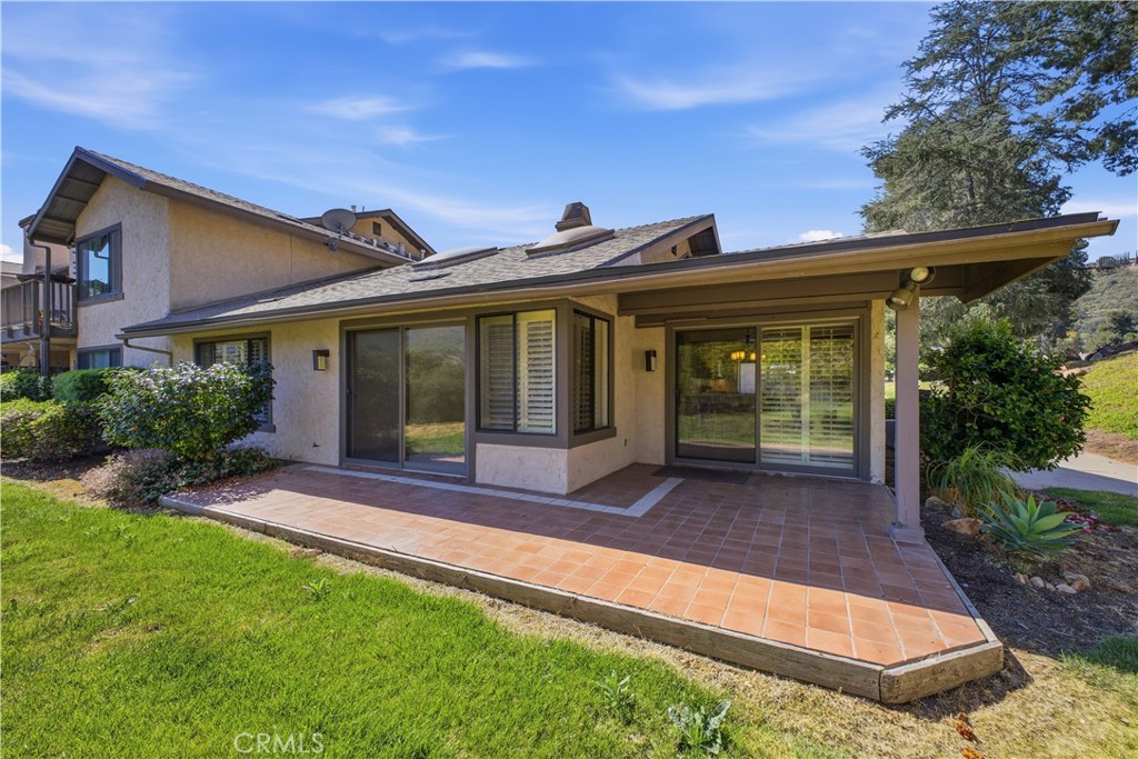1720 Pala Lake Drive Fallbrook, CA 92028 - Photo 1 of 1 a view of house with backyard porch and garden
