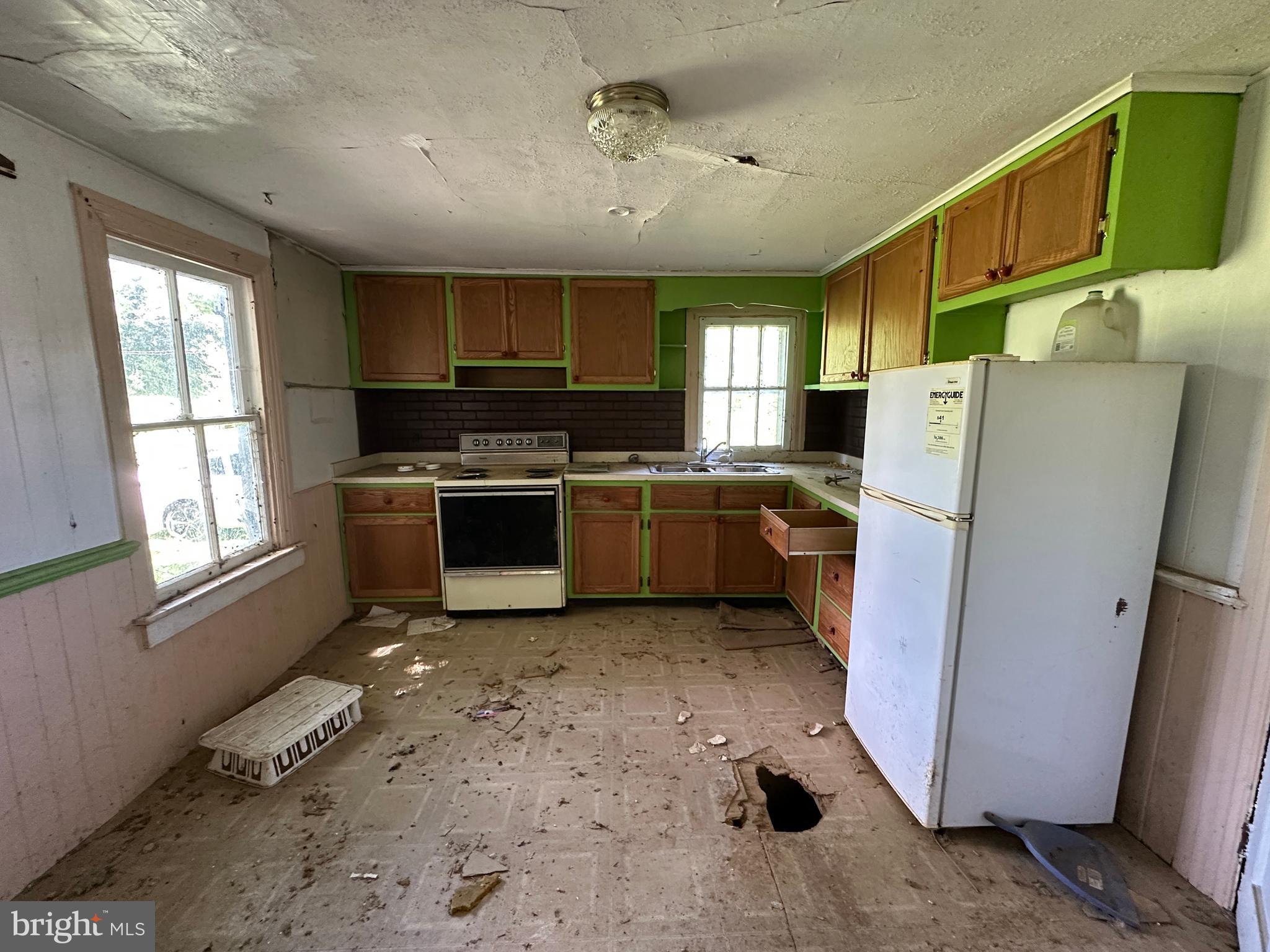 12007 White Hall Road Chewsville, MD 21783 - Photo 23 of 42 a kitchen with a refrigerator sink and stove