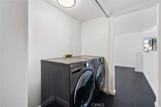 a bathroom with a shower a toilet and a sink