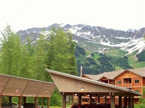 353 Hightower Road Other, AK 99587 - Photo 3 of 11 an aerial view of a house with a yard