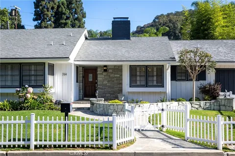 front view of house with a small yard