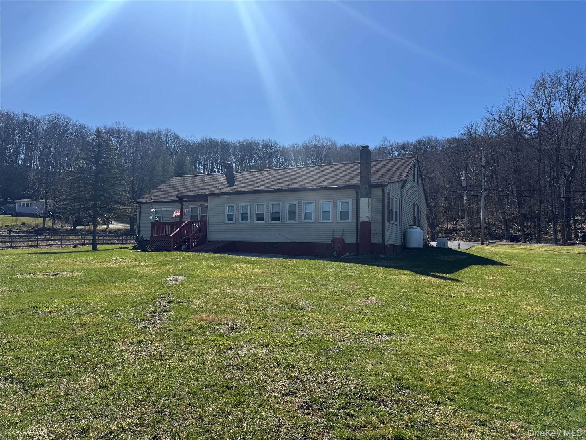 367 Mt Eve Road Goshen, NY 10924 - Photo 4 of 37 a view of a house with a yard and a large tree