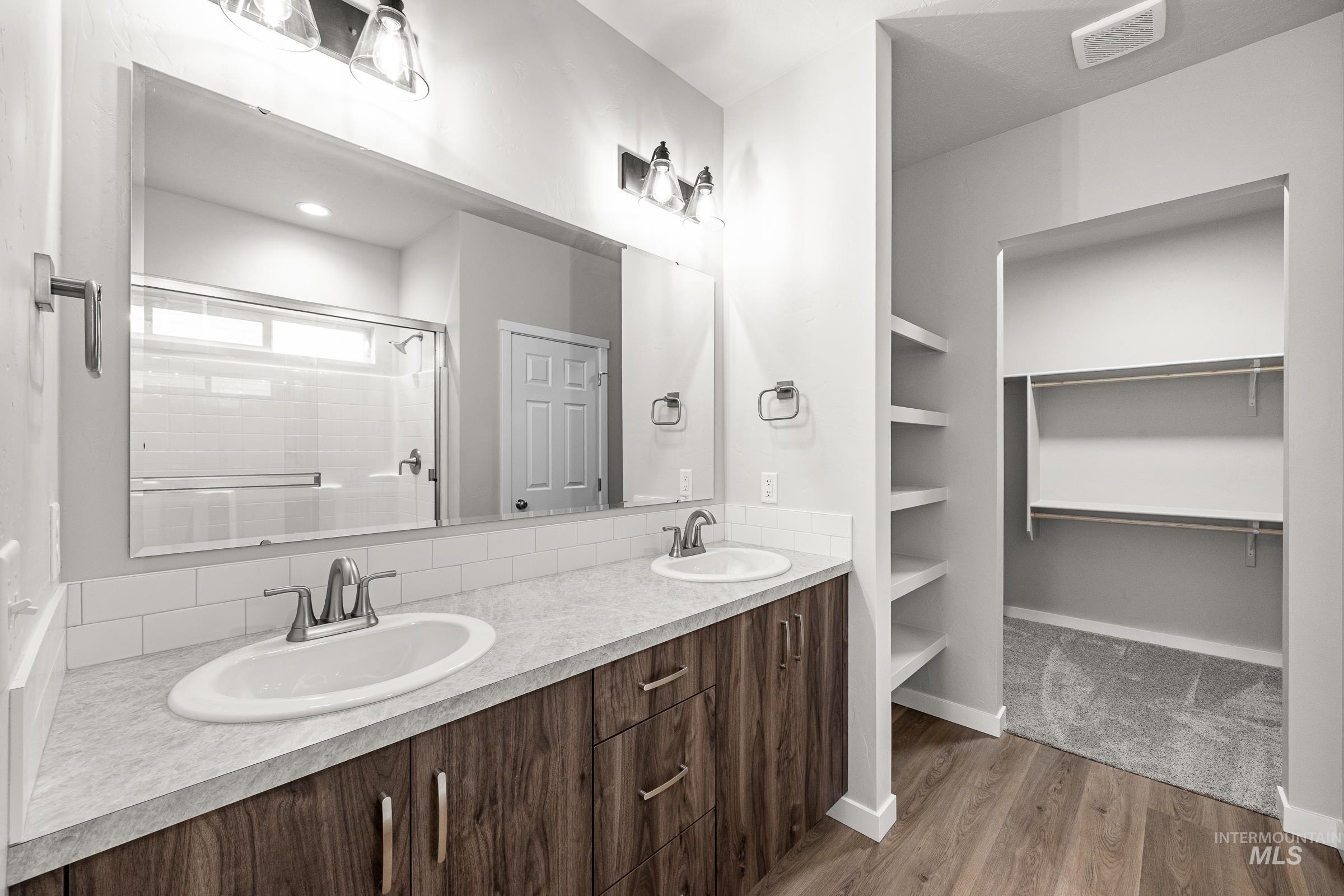 13656 Redway Court Caldwell, ID 83607 - Photo 20 of 21 Versatile bonus room featuring vaulted ceilings, recessed lighting, and soft gray carpeting
