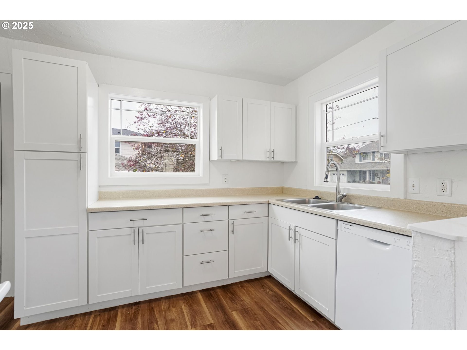 562 21st Street Northeast Salem, OR 97301 - Photo 12 of 45 a kitchen with sink cabinets and window