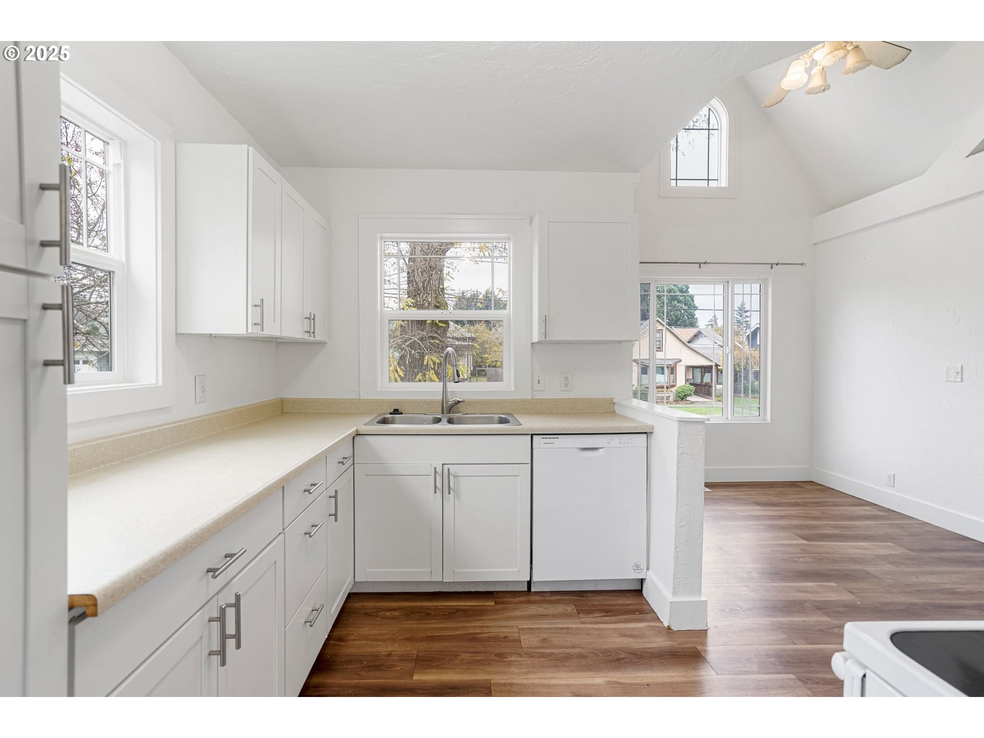 562 21st Street Northeast Salem, OR 97301 - Photo 13 of 45 a kitchen with a sink cabinets and window