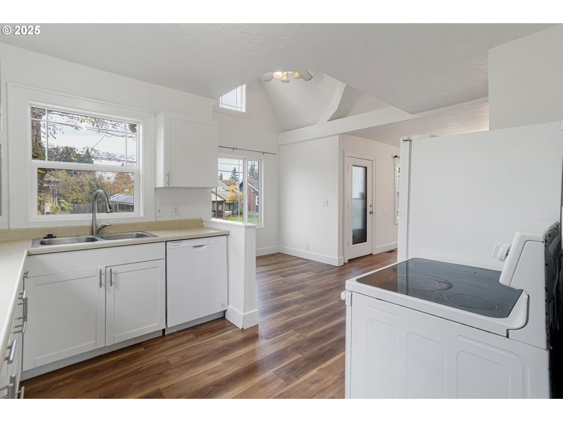 562 21st Street Northeast Salem, OR 97301 - Photo 15 of 45 a kitchen with a sink cabinets and window