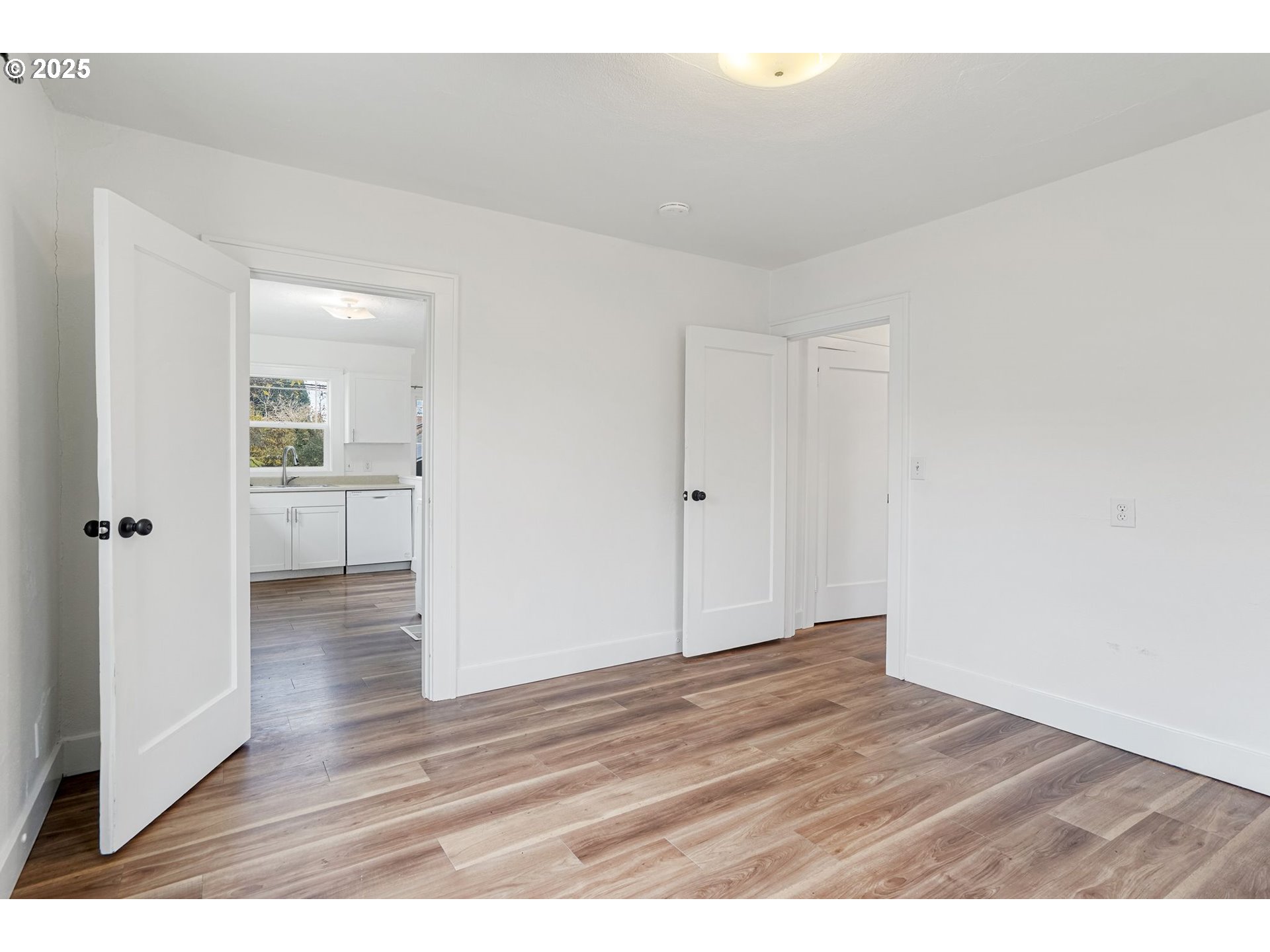 562 21st Street Northeast Salem, OR 97301 - Photo 17 of 45 a view of an empty room and wooden floor