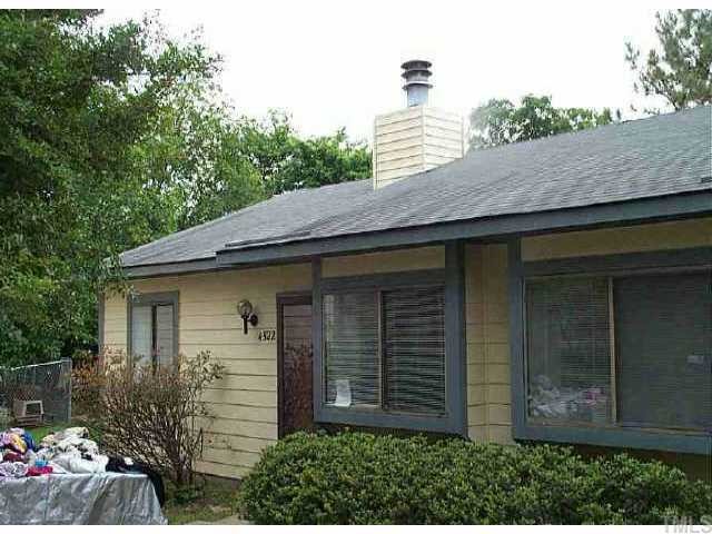 4522 New Hope Raleigh, NC 27604 - Photo 1 of 1 a view of a house with a yard