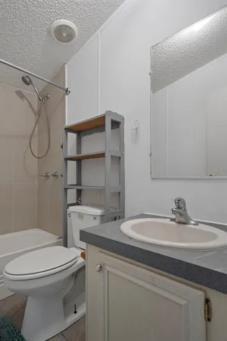 a backyard of a house with seating space