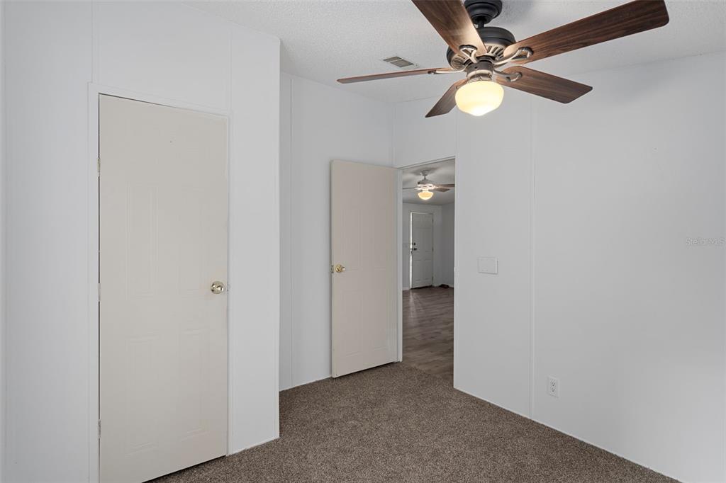 6176 South Hancock Road Homosassa, FL 34448 - Photo 14 of 33 an view of a chandelier fan in a room